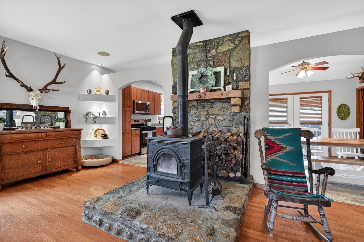 14091 Stamper Road Moores Hill, IN 47032 - Photo 7 of 49 Living room wood burning stove