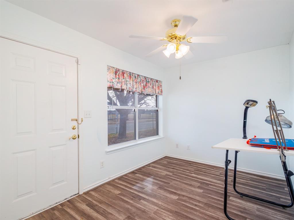 202 Abby Road Early, TX 76802 - Photo 16 of 28 a bedroom with a bed and a window