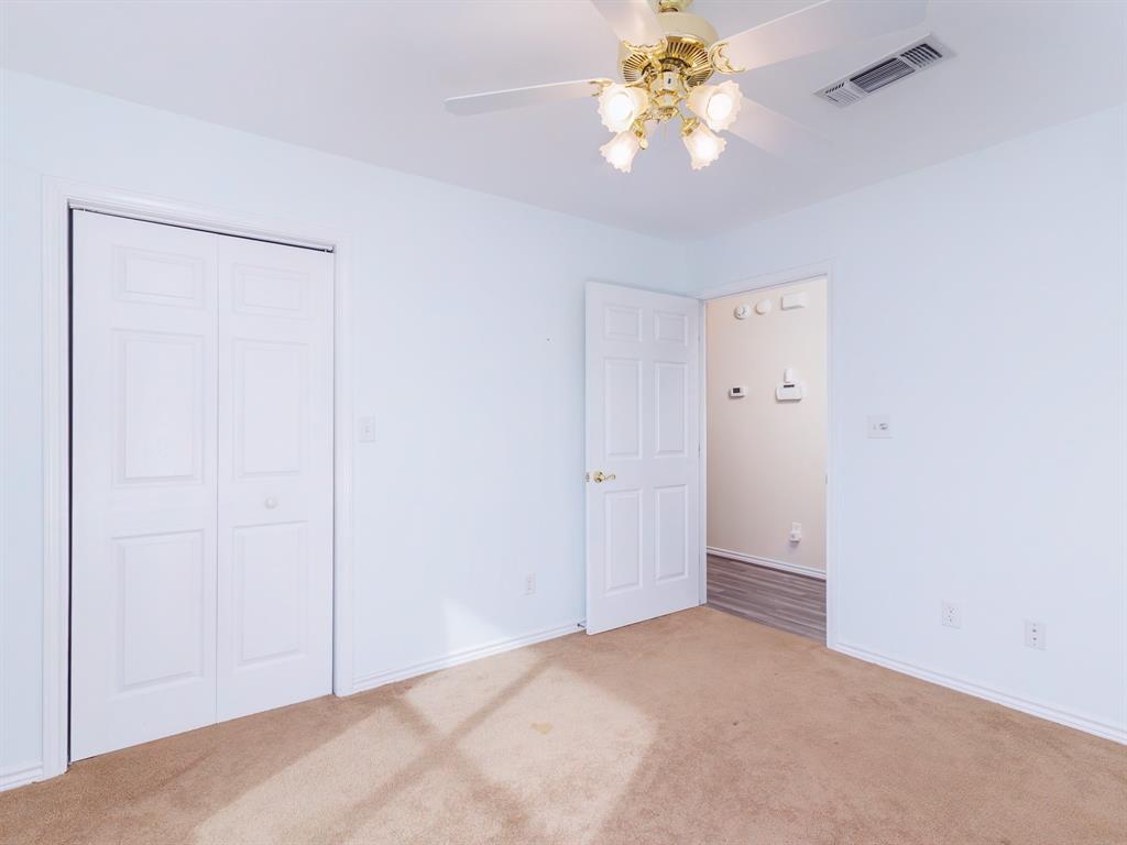 202 Abby Road Early, TX 76802 - Photo 19 of 28 a view of empty room with window