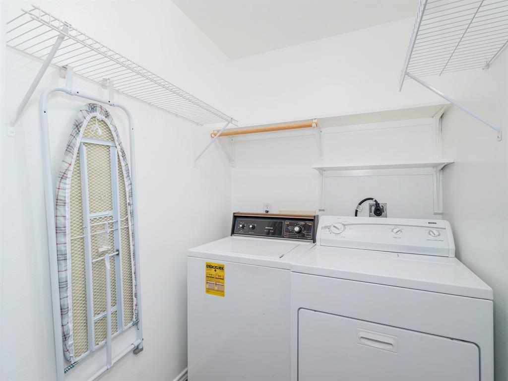 202 Abby Road Early, TX 76802 - Photo 21 of 28 a utility room with dryer and washer