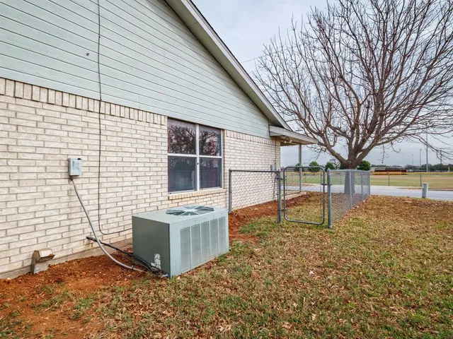 a house view with a backyard