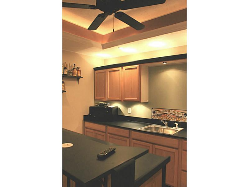 1014 Gornik Road Trafford, PA 15085 - Photo 22 of 25 Basement/Game Room. Another view of bar