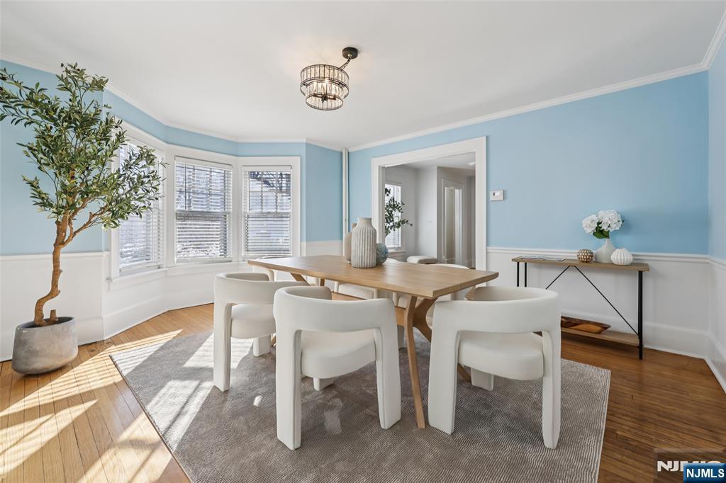 520 Hillcrest Road Ridgewood, NJ 07450 - Photo 12 of 27 a view of a dining room with furniture and wooden floor