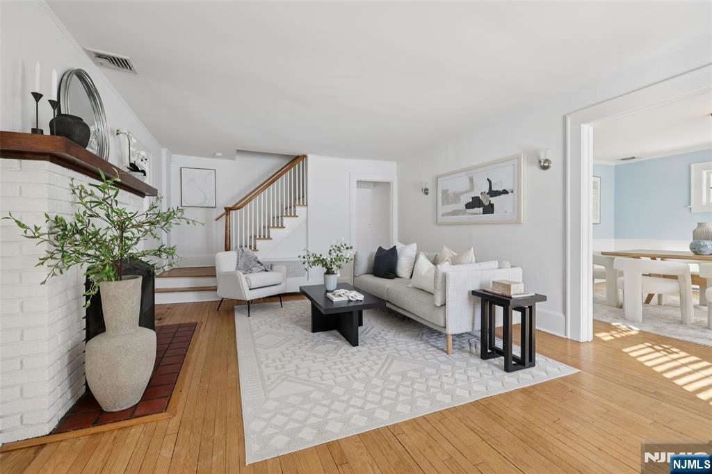 520 Hillcrest Road Ridgewood, NJ 07450 - Photo 3 of 27 a living room with furniture and a wooden floor