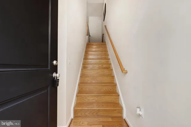 a view of balcony with wooden floor