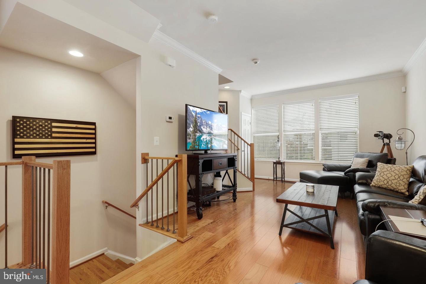 205 Woodstream Circle, Unit 2984 Stafford, VA 22556 - Photo 3 of 21 a living room with furniture and a wooden floor
