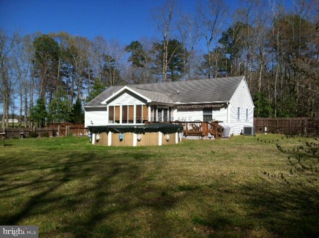 8037 Downs Road Newark, MD 21841 - Photo 4 of 23 a house view with a garden space