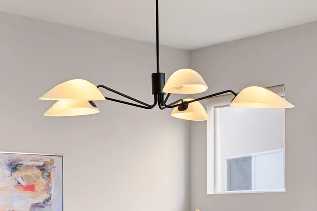a view of a bathroom with a sink and a mirror