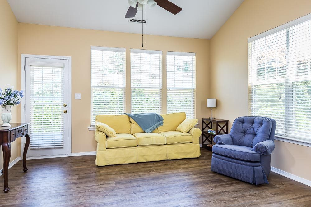 8308 Chimneycap Drive Raleigh, NC 27613 - Photo 8 of 23 Soaring ceilings and abundant windows lend a sense of expansiveness and airiness. Living Room