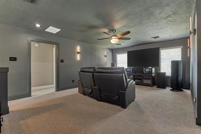 a bedroom with two beds and a table