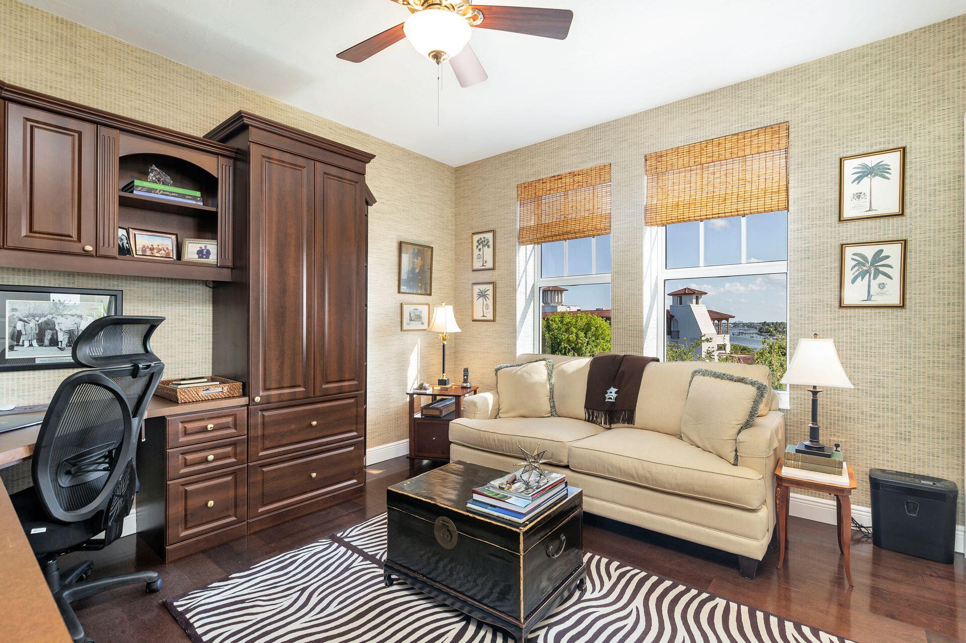 700 Highway 1, Unit 401 Jupiter, FL 33477 - Photo 28 of 39 a living room with furniture a rug and a window