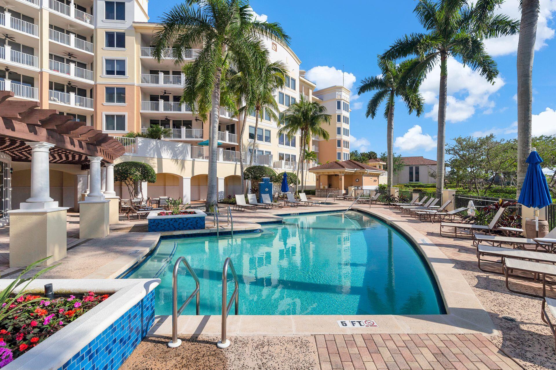 700 Highway 1, Unit 401 Jupiter, FL 33477 - Photo 38 of 39 a view of swimming pool with outdoor seating and plants