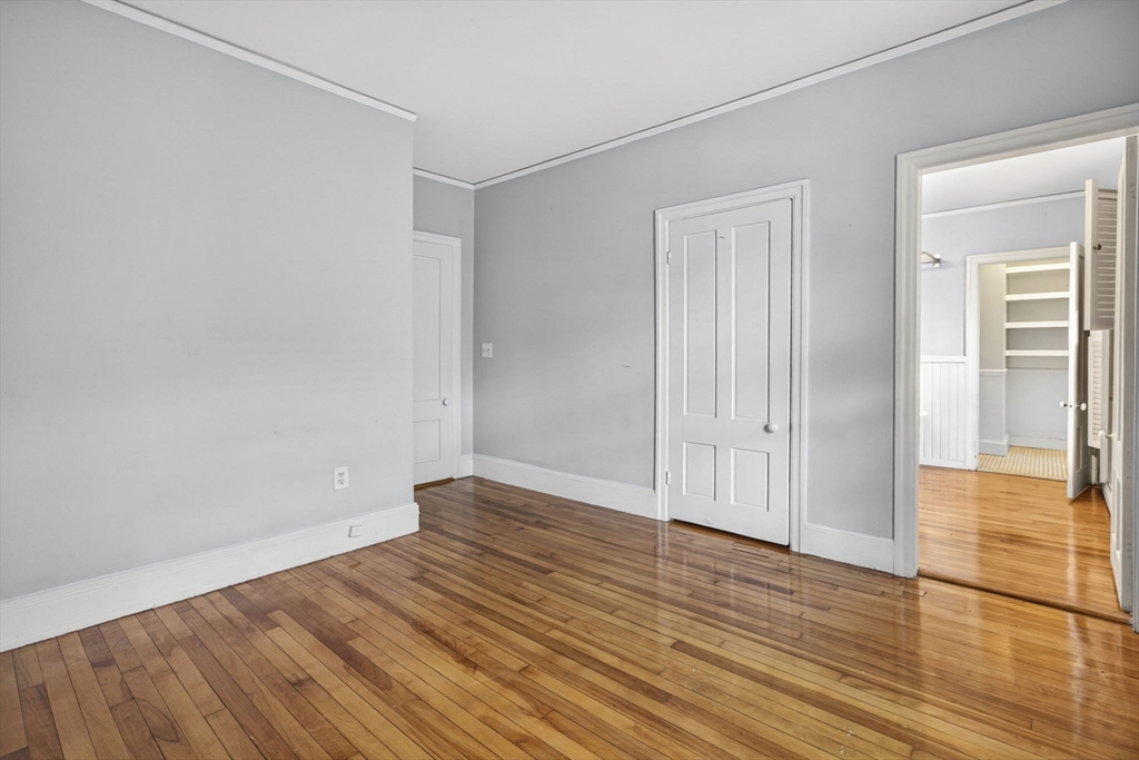 12 Crown Street Worcester, MA 01609 - Photo 20 of 42 wooden floor in an empty room