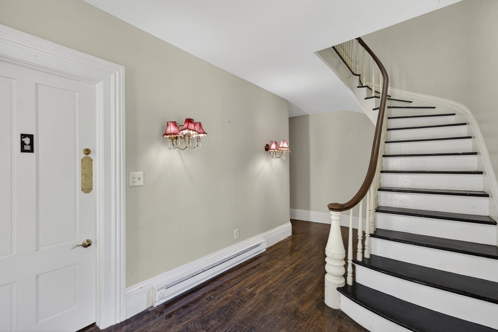 12 Crown Street Worcester, MA 01609 - Photo 2 of 42 a view of entryway with wooden floor