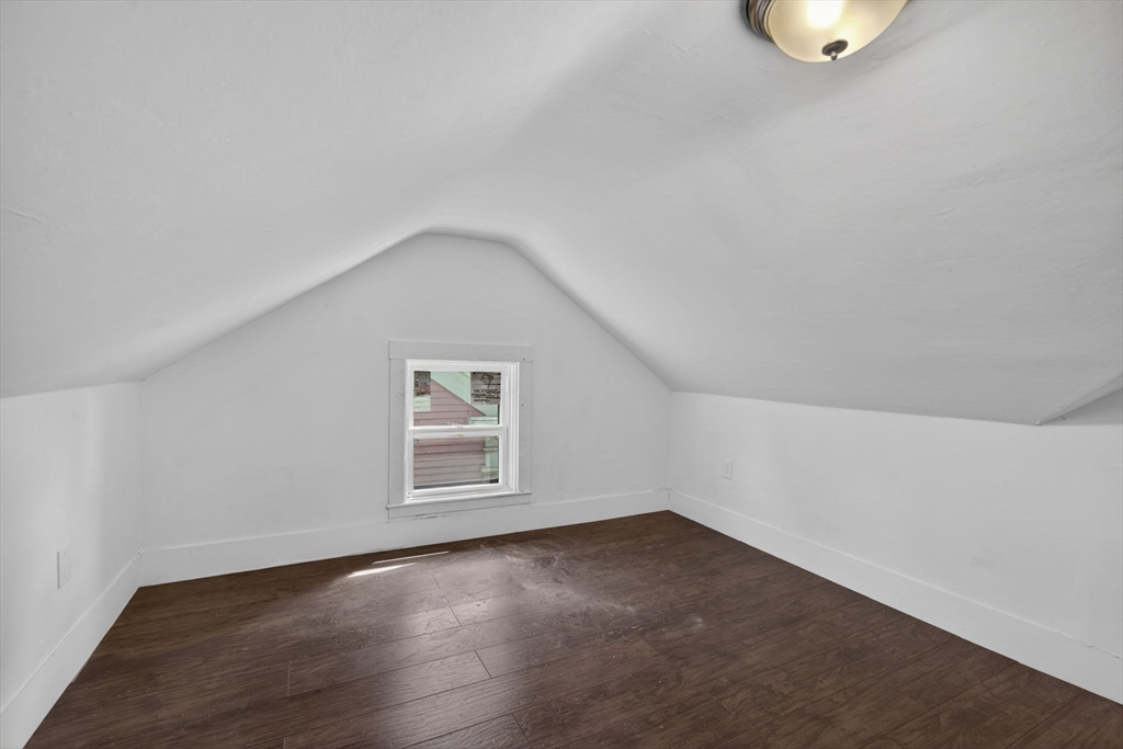 12 Crown Street Worcester, MA 01609 - Photo 33 of 42 an empty room with a empty space and window