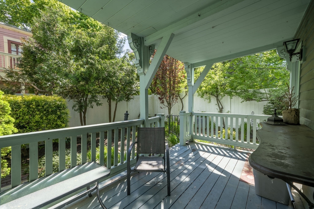 12 Crown Street Worcester, MA 01609 - Photo 42 of 42 a view of a wooden deck with a large window