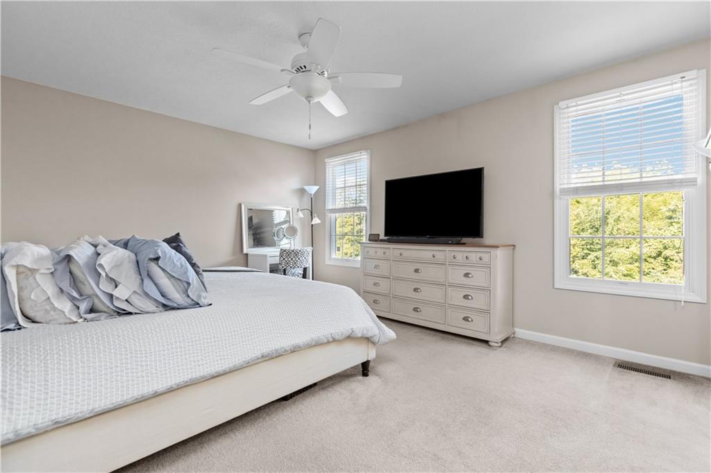 102 Castle View Drive McKees Rocks, PA 15136 - Photo 23 of 30 a bedroom with bed tv and window