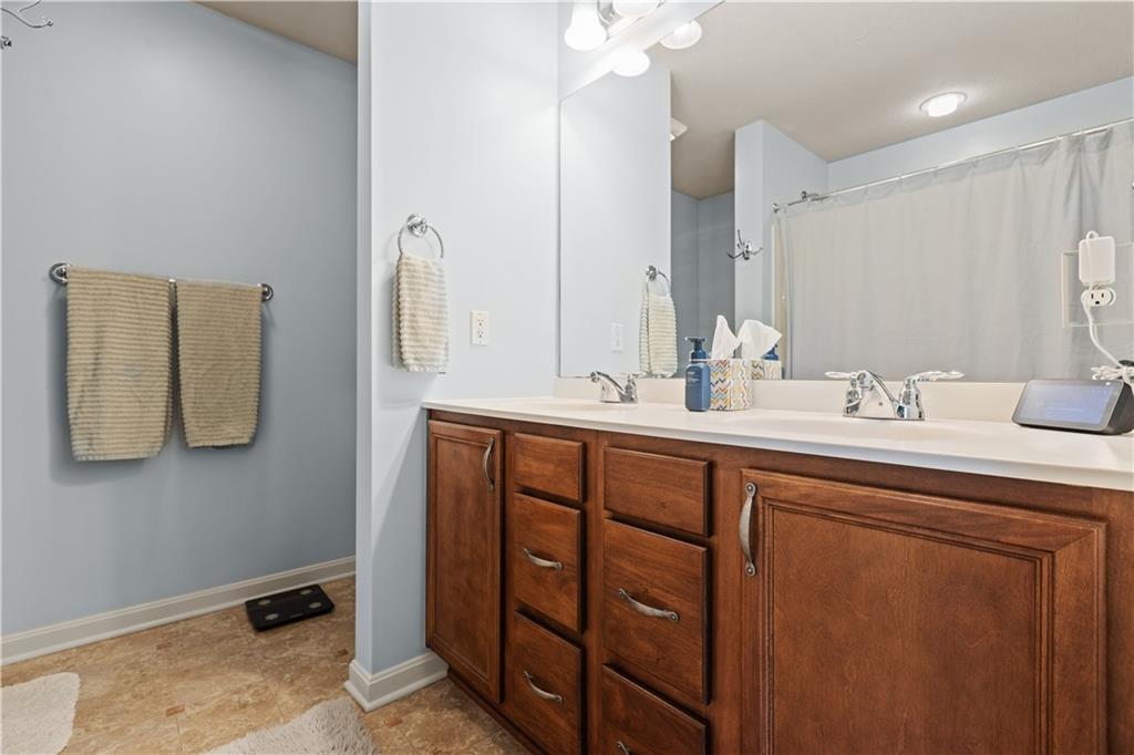 102 Castle View Drive McKees Rocks, PA 15136 - Photo 25 of 30 a bathroom with a double vanity sink and mirror