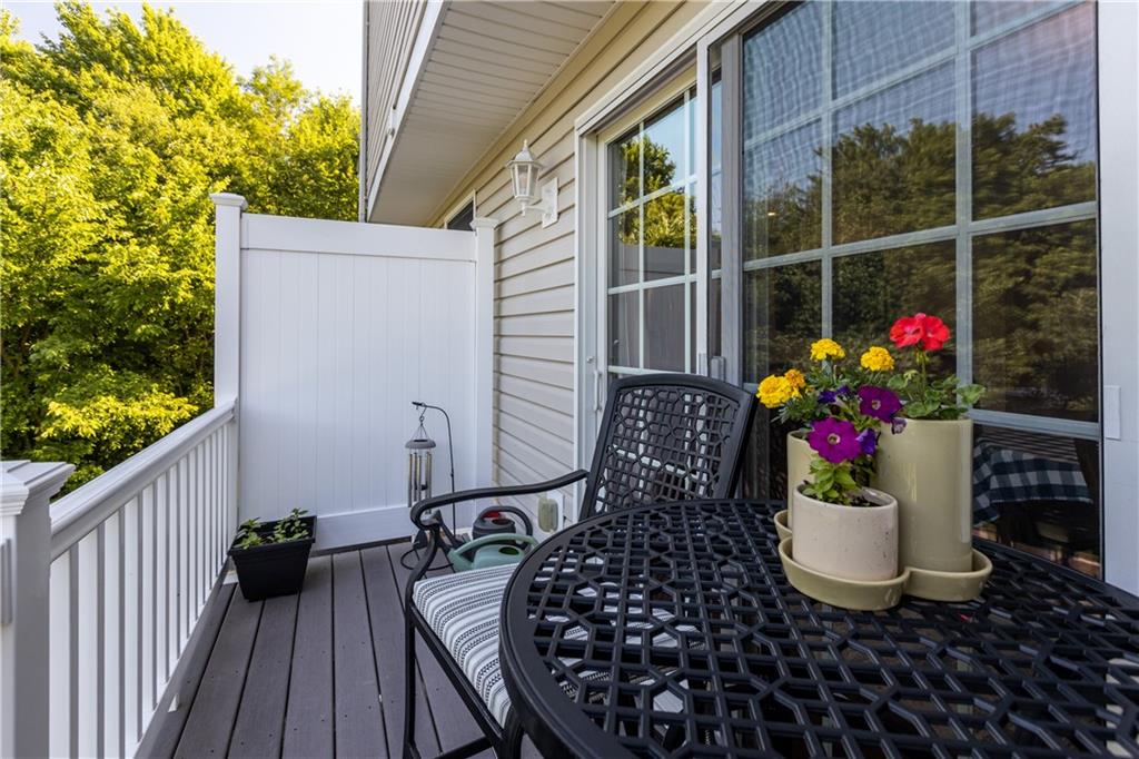 102 Castle View Drive McKees Rocks, PA 15136 - Photo 30 of 30 a table and chair sitting in patio of a house