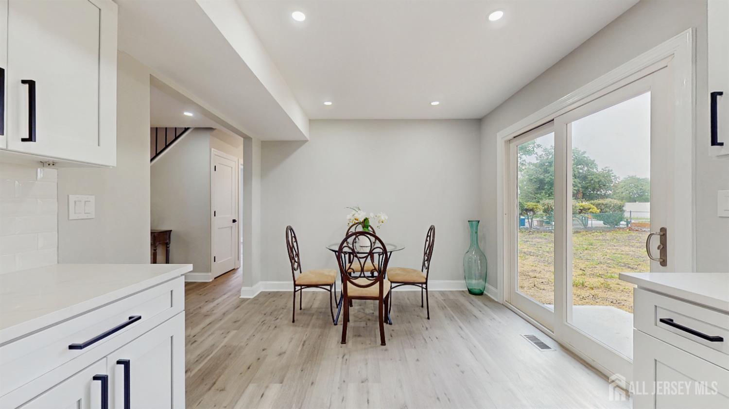 17 Tamarack Road Somerset, NJ 08873 - Photo 5 of 13 a living room with furniture and a wooden floor