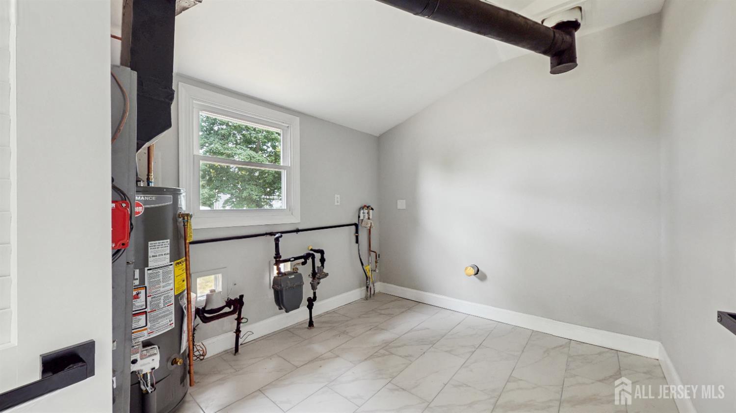 17 Tamarack Road Somerset, NJ 08873 - Photo 9 of 13 a view of entryway with a window