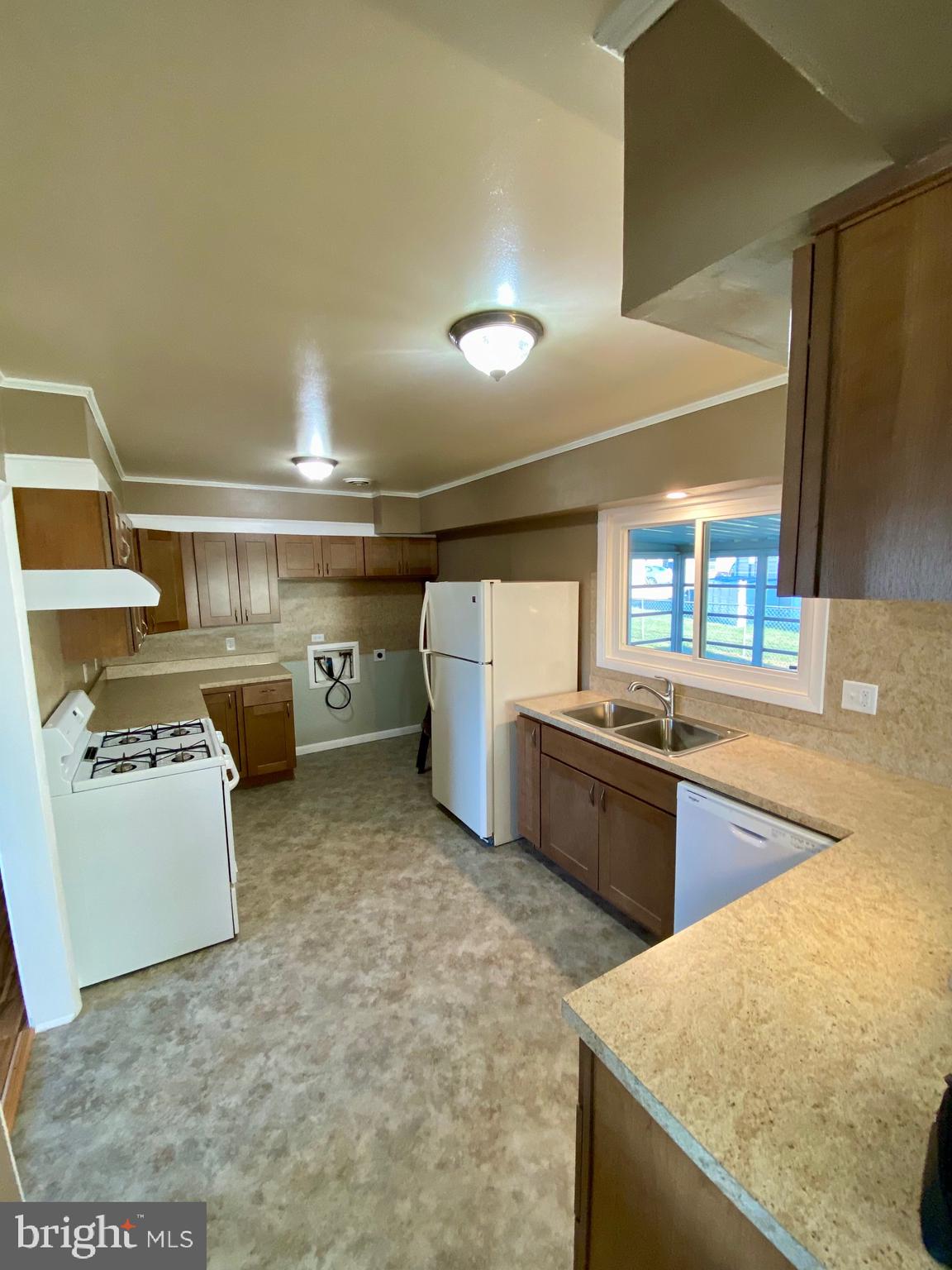 377 Juniper Lane Hanover, PA 17331 - Photo 12 of 24 a kitchen with a stove and a refrigerator