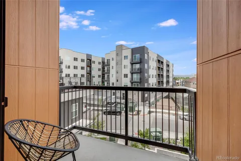 a view of balcony with a potted plant