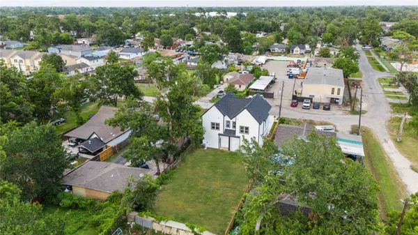 an aerial view of a house with a garden