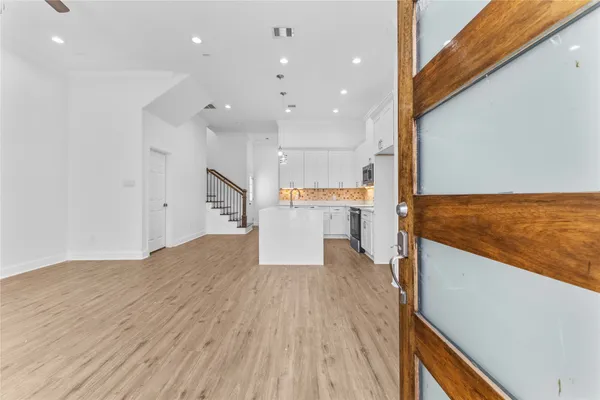 a view of kitchen with wooden floor