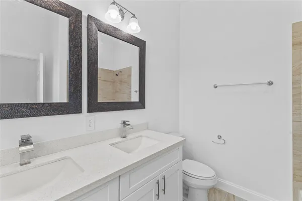 an empty room with a bathroom