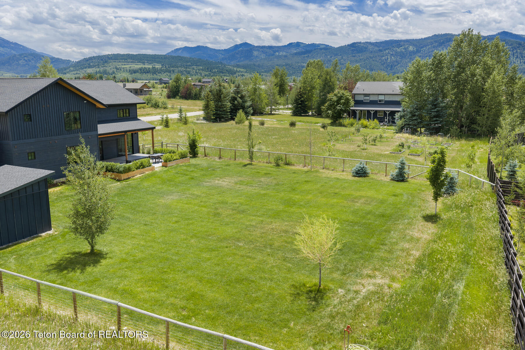 9194 Megan Street Victor, ID 83455 - Photo 23 of 24 23 Fenced Backyard