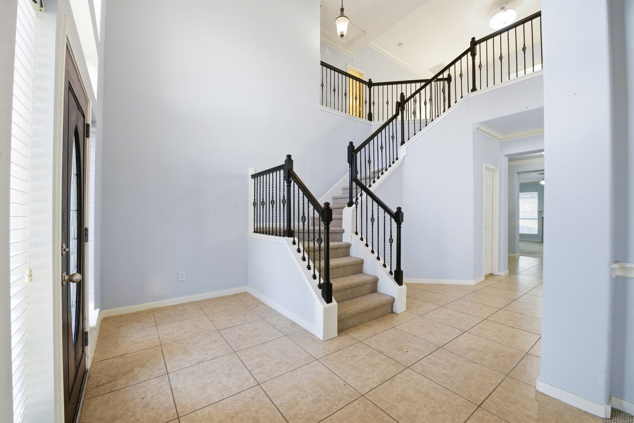 12522 East Nantucket Road Sugar Land, TX 77478 - Photo 11 of 39 a view of entryway and hall with a front door