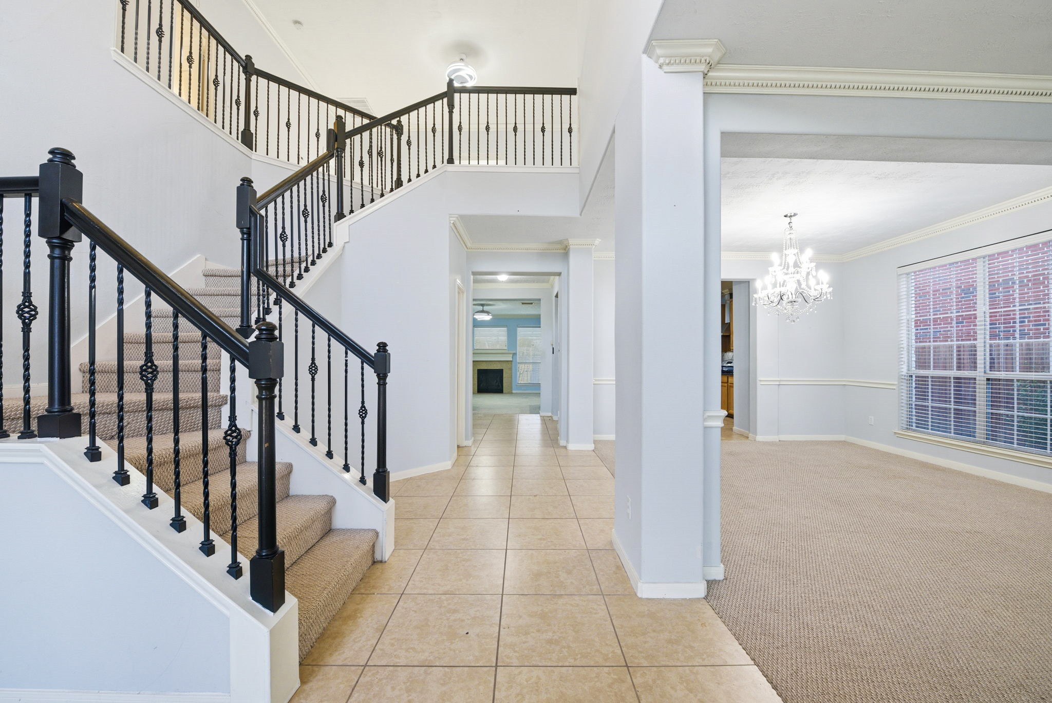 12522 East Nantucket Road Sugar Land, TX 77478 - Photo 13 of 39 a view interior of a house with wooden floor and stairs
