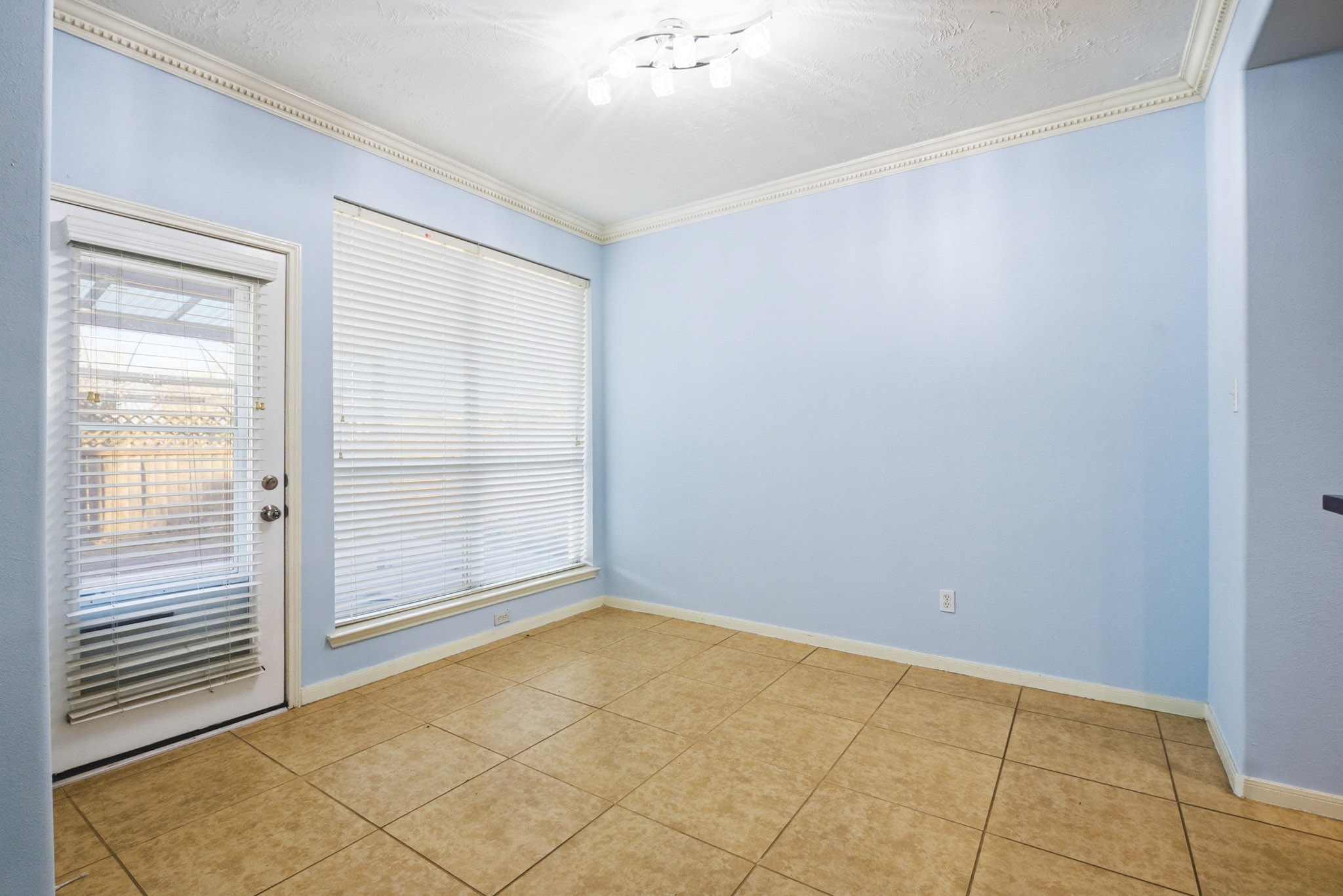 12522 East Nantucket Road Sugar Land, TX 77478 - Photo 16 of 39 a view of an empty room with a window