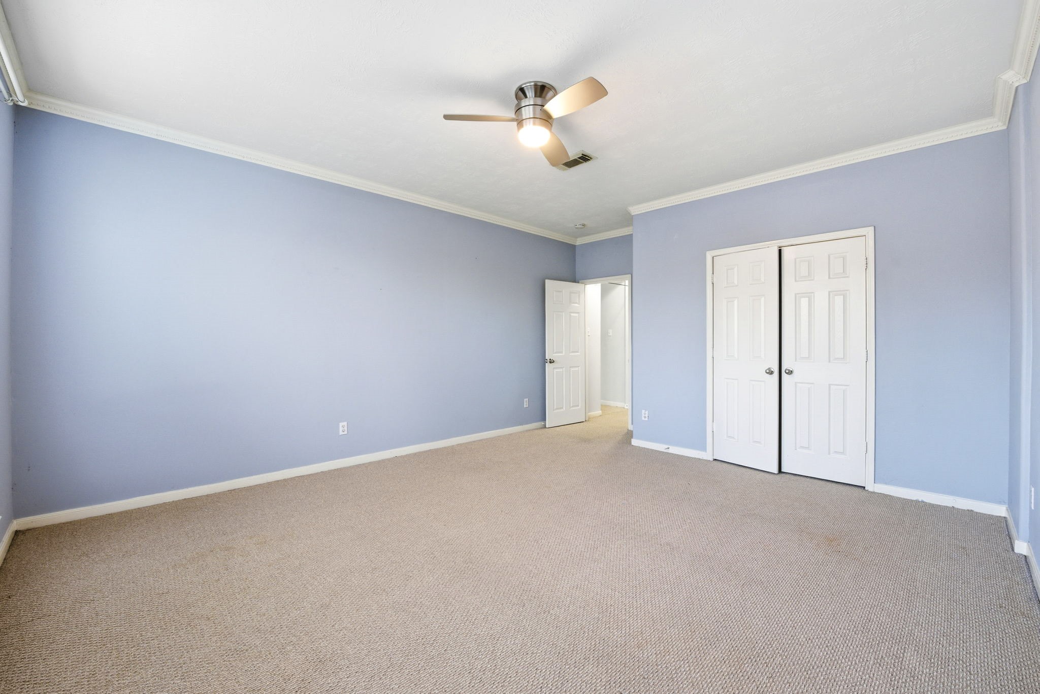 12522 East Nantucket Road Sugar Land, TX 77478 - Photo 20 of 39 a view of an empty room with a window