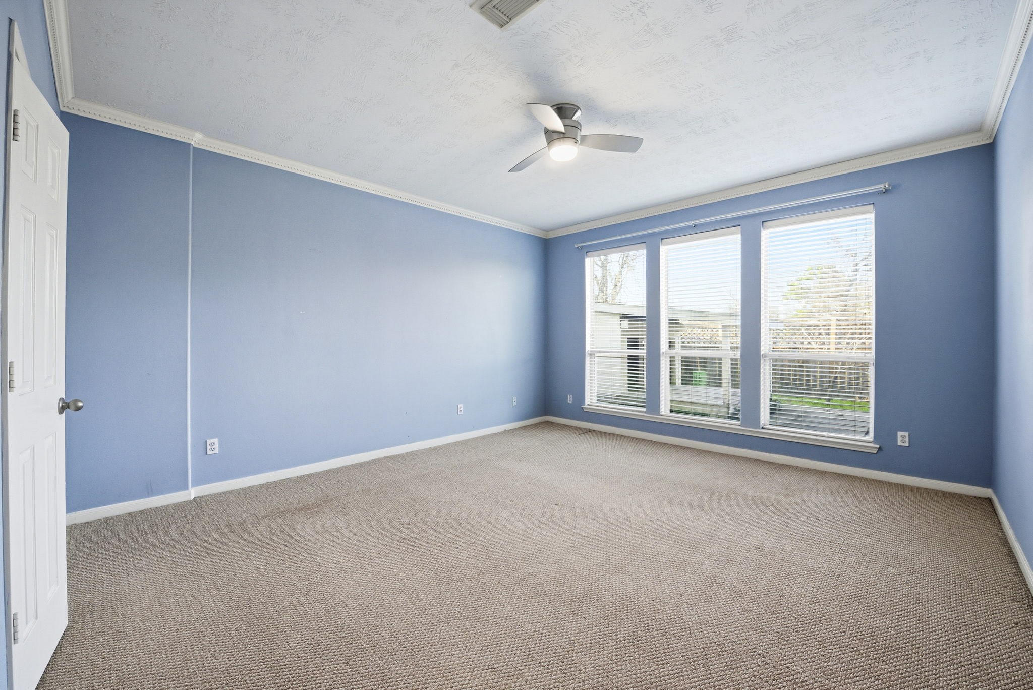 12522 East Nantucket Road Sugar Land, TX 77478 - Photo 21 of 39 a view of an empty room with a window