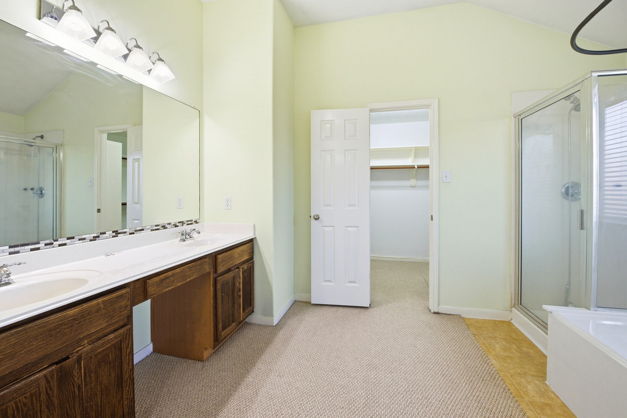 12522 East Nantucket Road Sugar Land, TX 77478 - Photo 28 of 39 a bathroom with a double vanity sink mirror and double