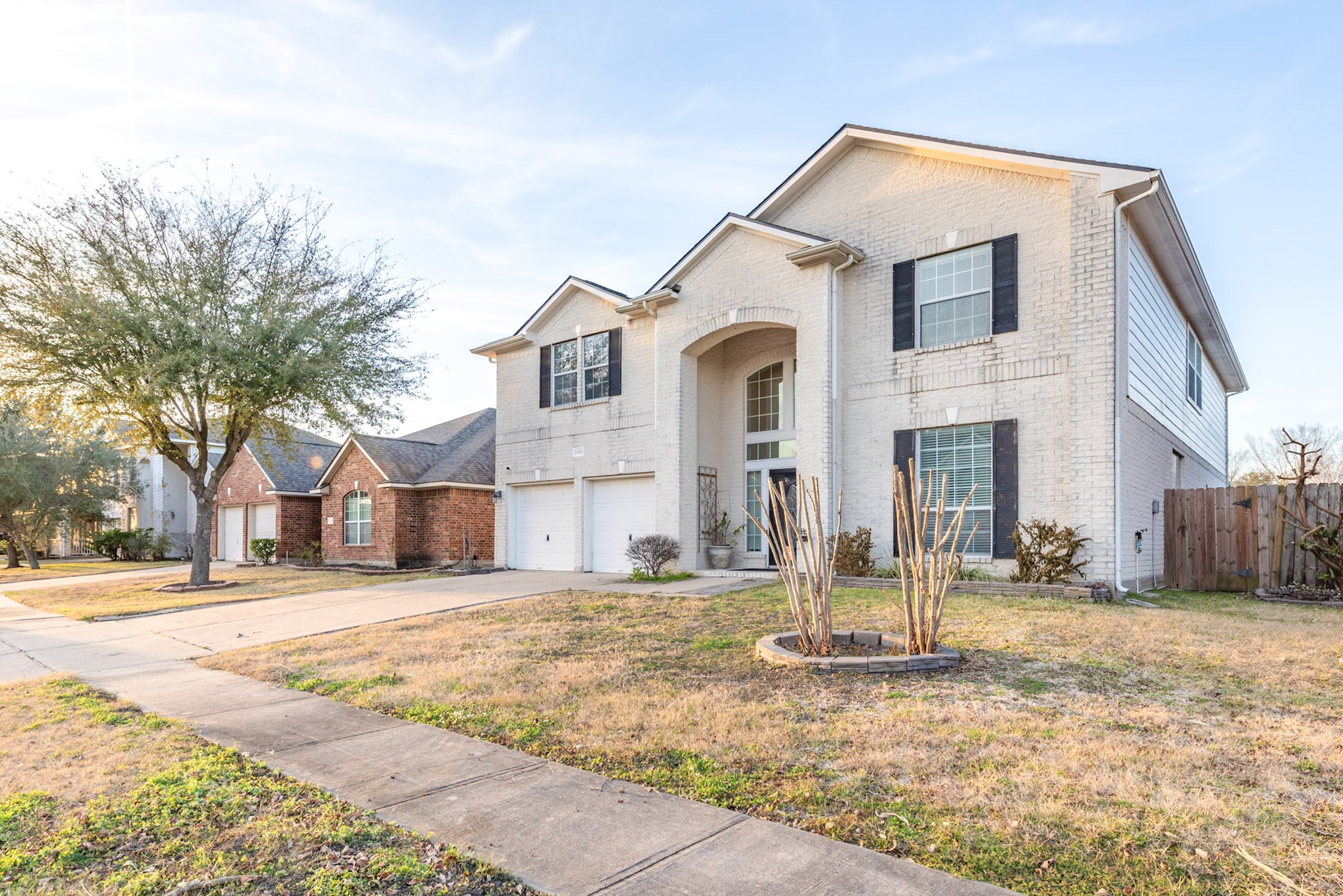 12522 East Nantucket Road Sugar Land, TX 77478 - Photo 3 of 39 a front view of a house with a yard