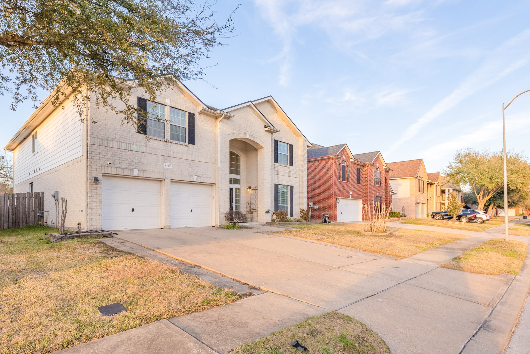 12522 East Nantucket Road Sugar Land, TX 77478 - Photo 4 of 39 a view of a house with a yard