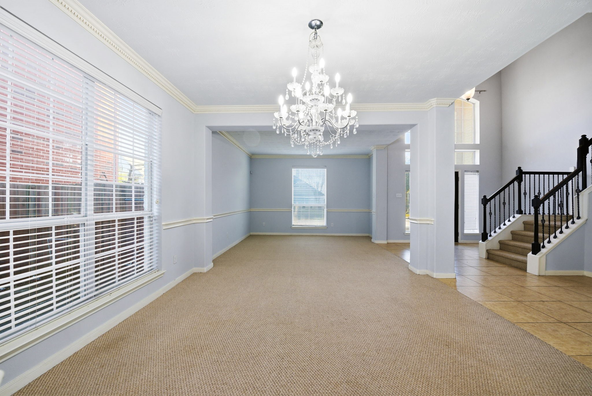 12522 East Nantucket Road Sugar Land, TX 77478 - Photo 10 of 39 a view of a big room with windows