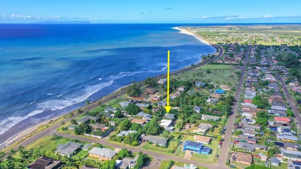 8520 Elepaio Road Kekaha, HI 96752 - Photo 1 of 30 a view of a yard with an ocean view
