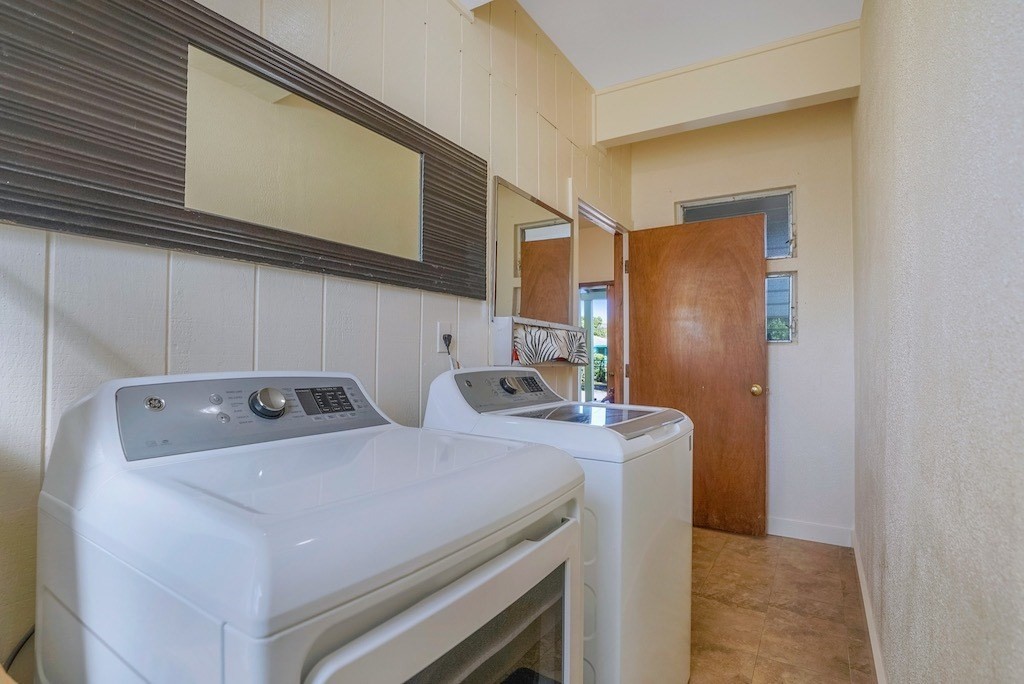 8520 Elepaio Road Kekaha, HI 96752 - Photo 24 of 30 a utility room with dryer and washer