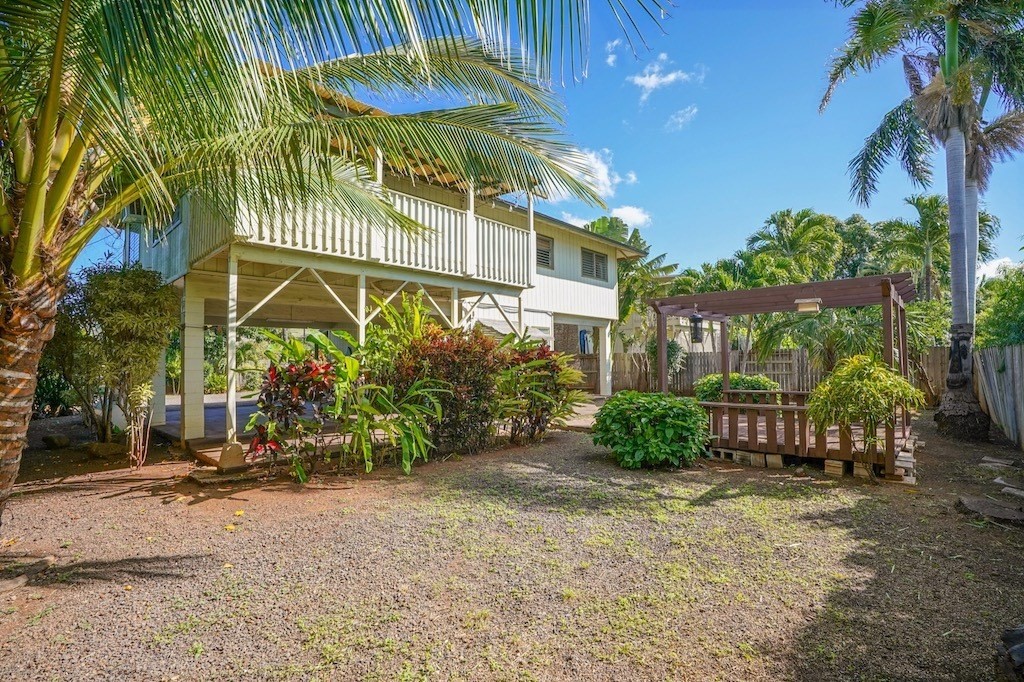 8520 Elepaio Road Kekaha, HI 96752 - Photo 25 of 30 a view of a house with a yard