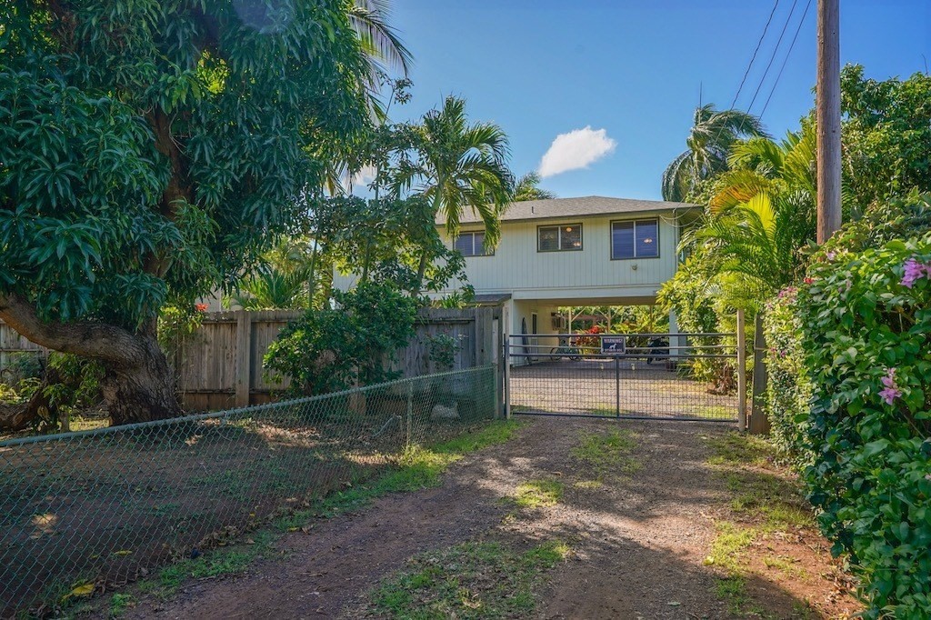8520 Elepaio Road Kekaha, HI 96752 - Photo 29 of 30 a front view of a house with garden