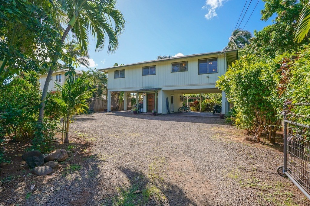 8520 Elepaio Road Kekaha, HI 96752 - Photo 30 of 30 a front view of a house with garden