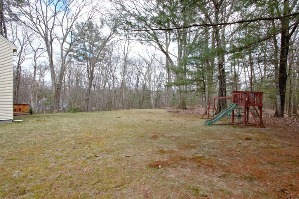 23 Campbell Road Wayland, MA 01778 - Photo 20 of 24 a view of outdoor space with deck and trees