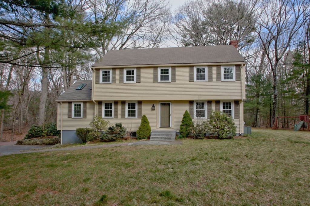 23 Campbell Road Wayland, MA 01778 - Photo 2 of 24 a front view of a house with a garden