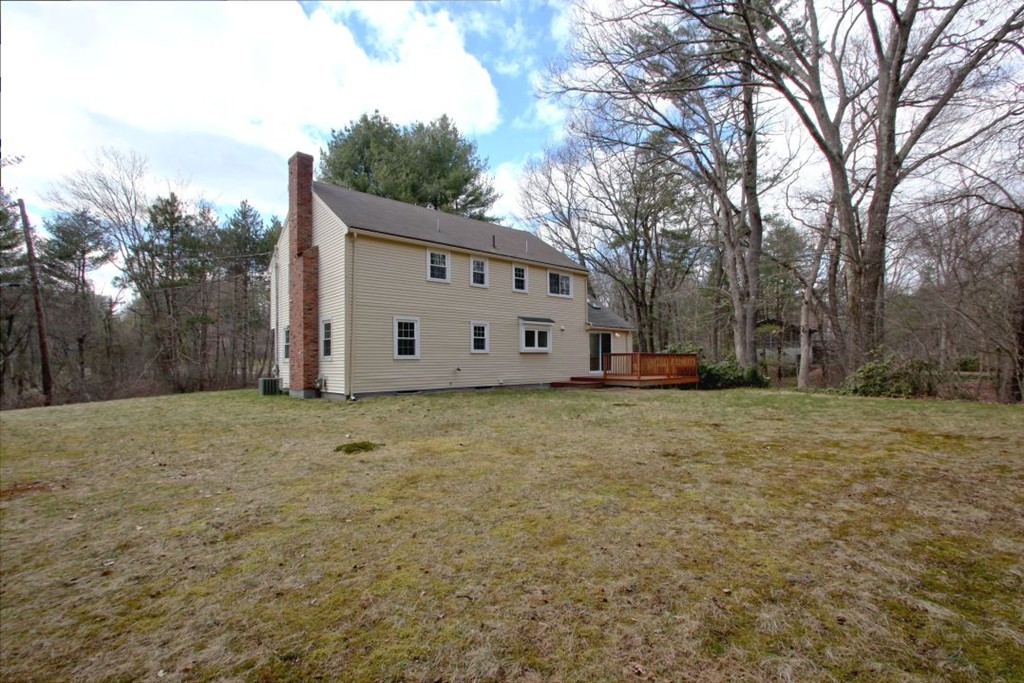 23 Campbell Road Wayland, MA 01778 - Photo 21 of 24 a view of a house with backyard
