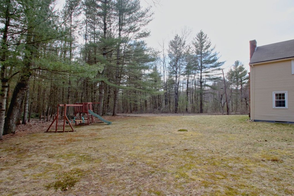 23 Campbell Road Wayland, MA 01778 - Photo 22 of 24 a view of backyard with trampoline
