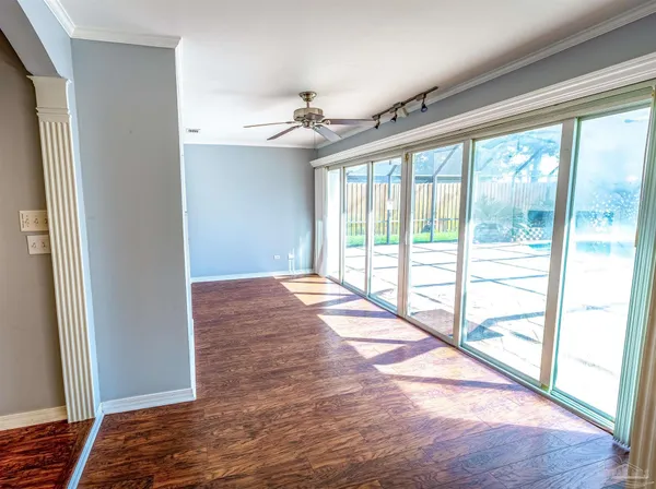 a view of livingroom with hardwood floor and a ceiling fan